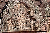 Banteay Srei temple - southern library west pediment, Kama aiming an arrow to Shiva